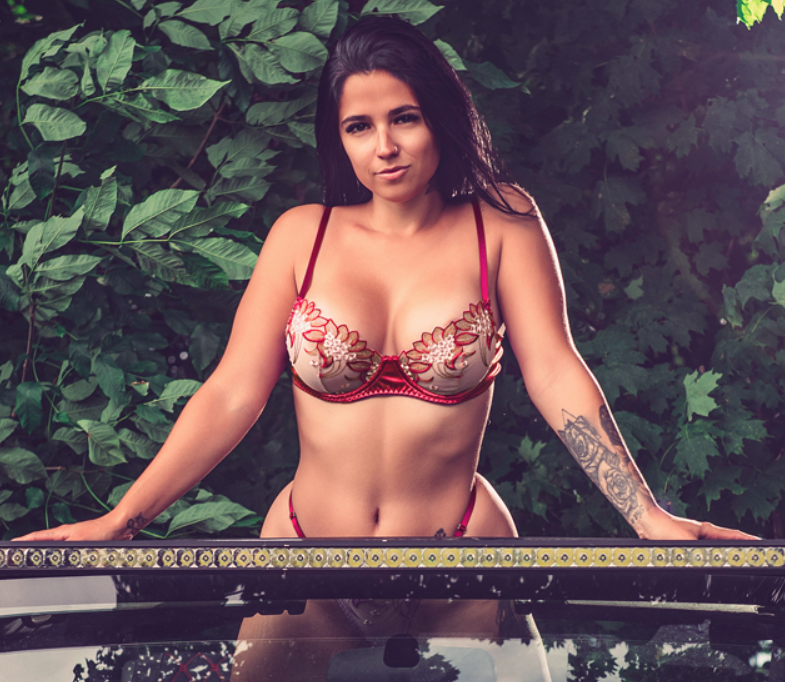Émilie Bérubé, a French-Canadian OnlyFans creator, in a nude bodysuit