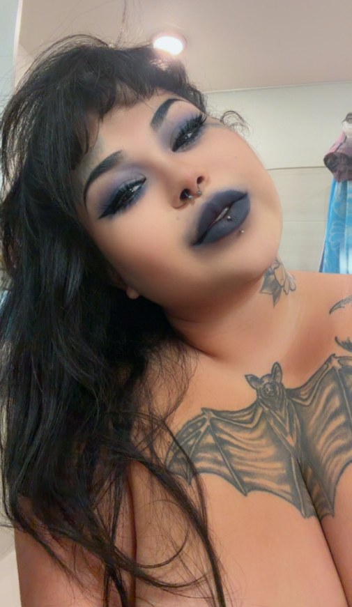 Kai Goth, a tattooed Puerto Rican goth Latina OnlyFans model