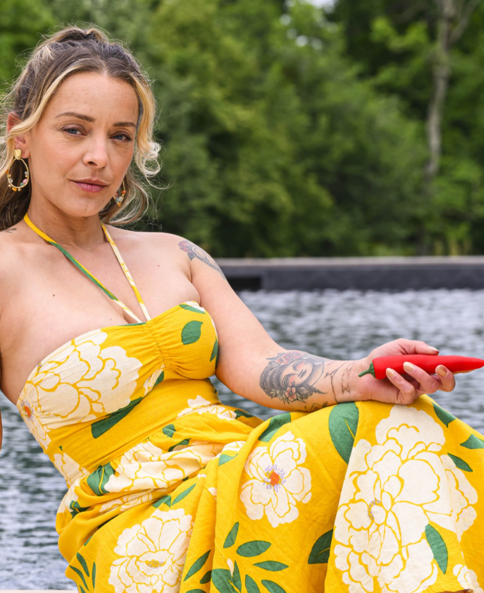 Liza del Sierra, a French OnlyFans adult star, in a yellow floral dress