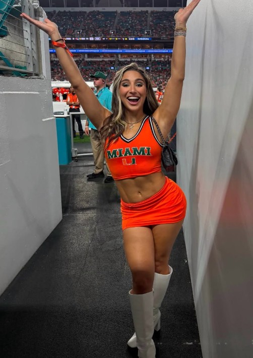 Abella Danger, an American pornstar, in a Miami cheer outfit at a stadium
