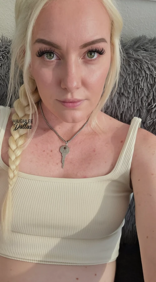 Haighlee Dallas with braided blonde hair in a cream crop top