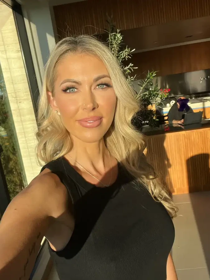 Holly Hotwife in a black top, the Houston half of a long running OnlyFans couple
