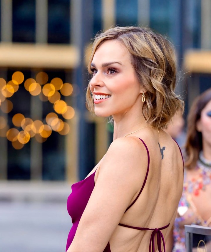 Serenity Cox, a Toronto Canadian OnlyFans MILF creator in a maroon dress